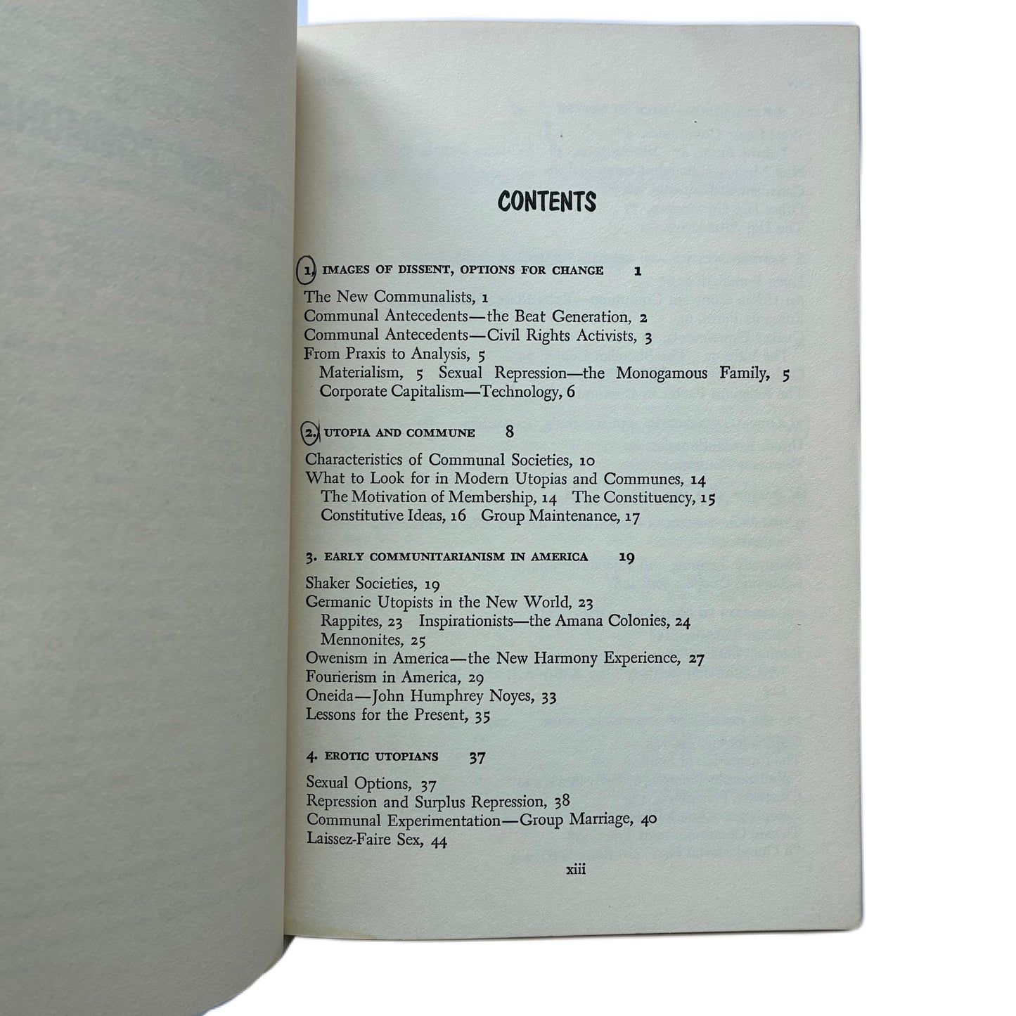 The new communes; Coming together in America by Ron E. Roberts